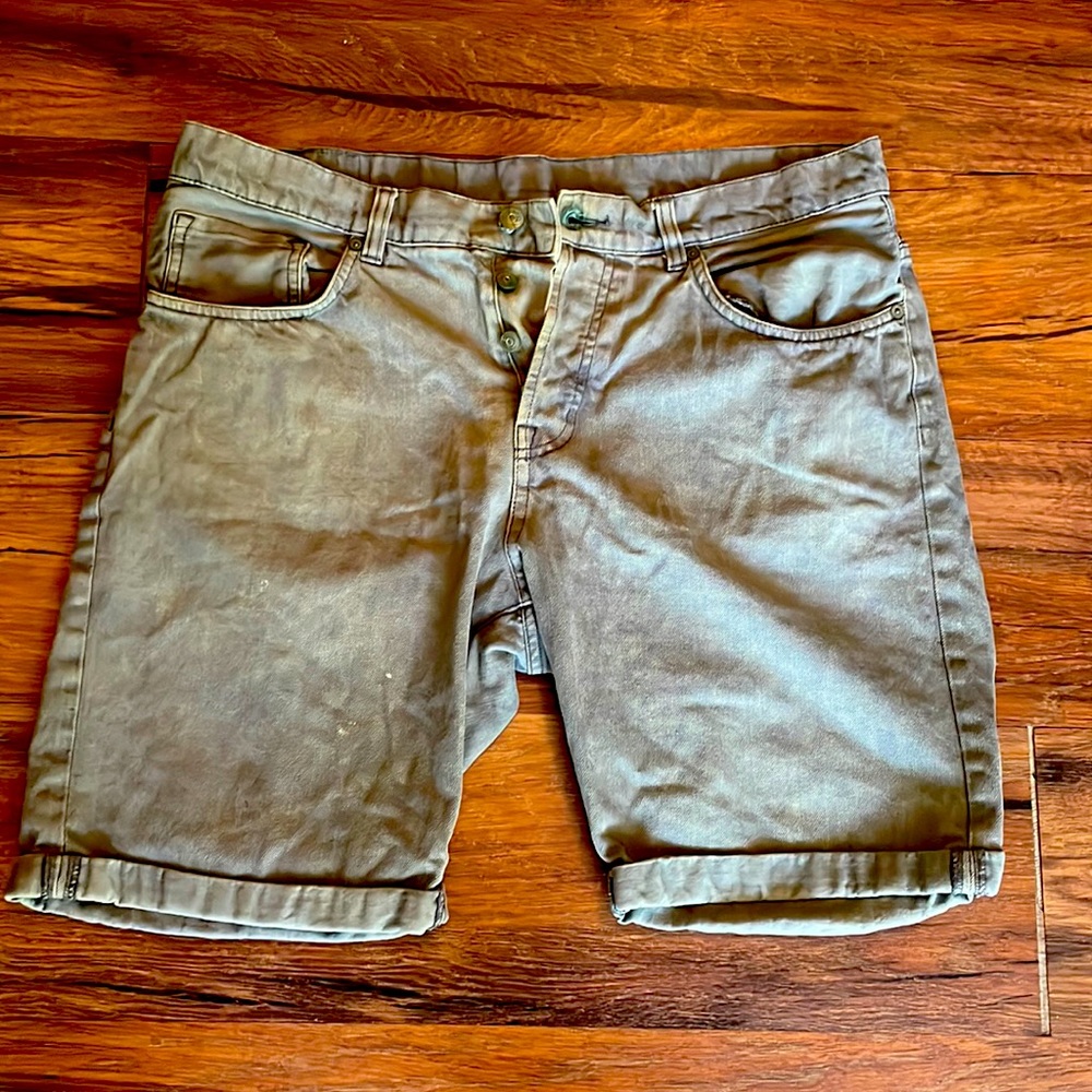 Divided Jean shorts for men, size 34, gently used.